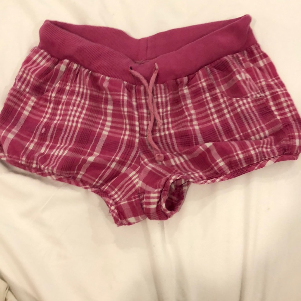 Pink shorts with white stripes